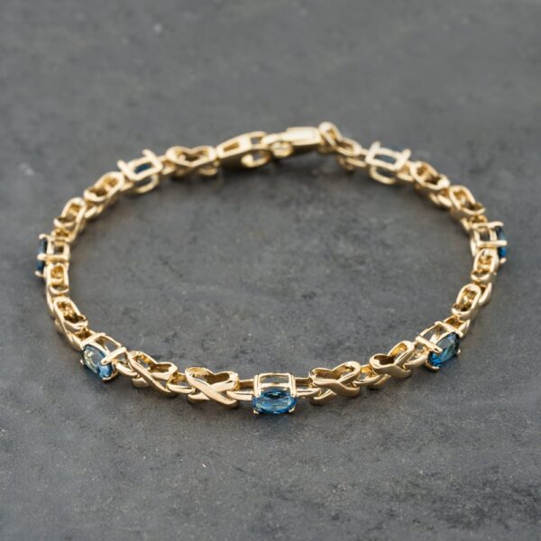 Pre-Owned 9ct Yellow Gold Blue Topaz Set 7.5 Inch Bracelet 41281810