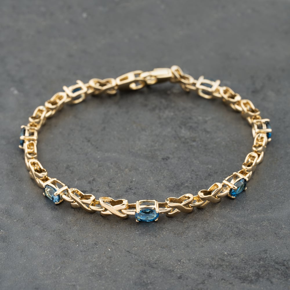 Pre-Owned 9ct Yellow Gold Blue Topaz Set 7.5 Inch Bracelet 41281810