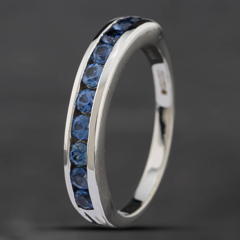 Pre-Owned 18ct White Gold Blue Topaz Half Eternity Ring 41481430