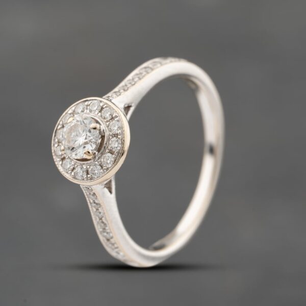 Pre-Owned 18ct White Gold 0.50ct Brilliant Cut Diamond Shoulder Set Halo Ring 41482357