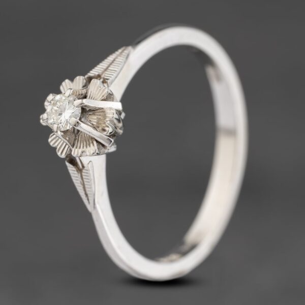 Pre-Owned 18ct White Gold 0.15ct Diamond Flower Shaped Diamond Cut Solitaire Ring 41482383