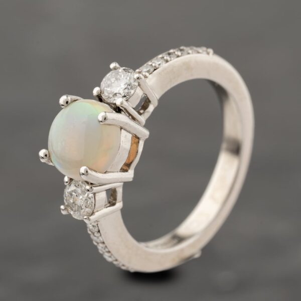 Pre-Owned Platinum Opal & 0.44ct Diamond Three Stone Ring 41482451