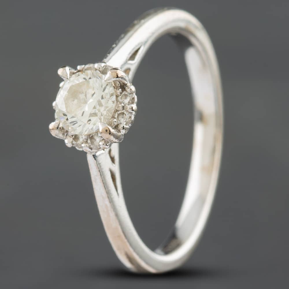 Pre-Owned 18ct White Gold 0.46ct Brilliant Cut Diamond Halo Solitaire Ring 4148581113