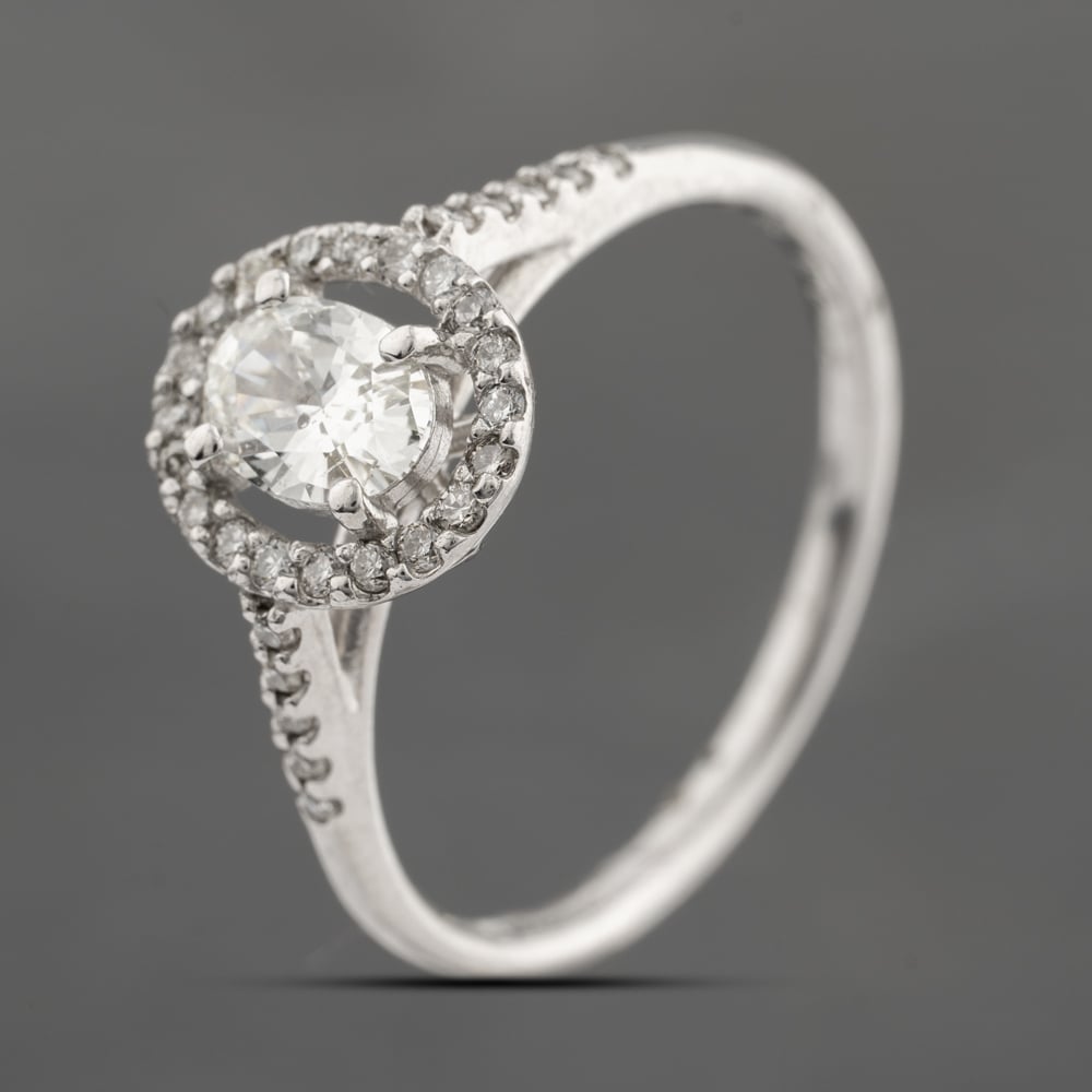 Pre-Owned 18ct White Gold 0.56ct Diamond Oval Halo Cluster Ring 43121247