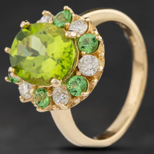 Pre-Owned 14ct Yellow Gold 3.65ct Peridot, 0.62ct Diamond & 0.62ct Tsavorite Oval Cluster Ring 4312215