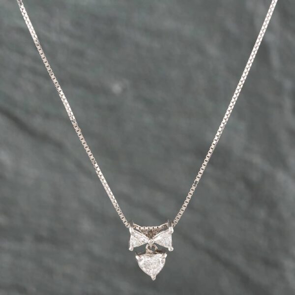 Pre-Owned Platinum 0.62ct Diamond Bow Pendant & 19 Inch Box Chain 43141014