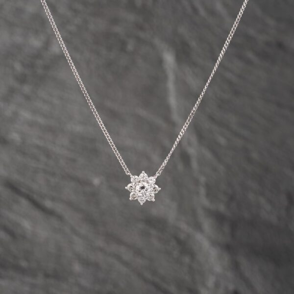 Pre-Owned Platinum 0.86ct Brilliant Cut Diamond Flower Cluster Pendant & 16 Inch Curb Chain 43141244