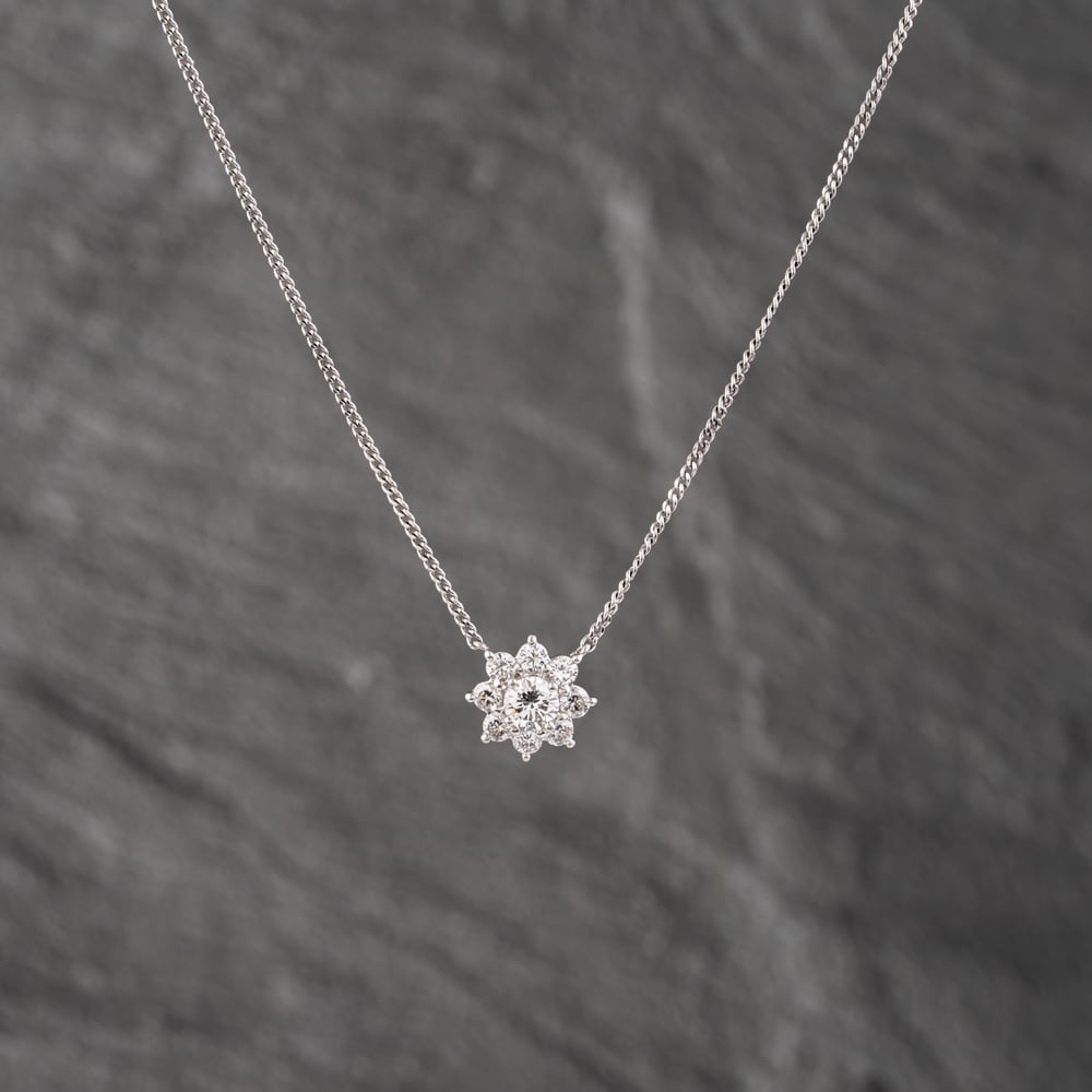 Pre-Owned Platinum 0.86ct Brilliant Cut Diamond Flower Cluster Pendant & 16 Inch Curb Chain 43141244