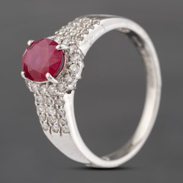 Pre-Owned Platinum 1.40ct Ruby & 0.37ct Brilliant Cut Diamond Oval Cluster Ring 43351050