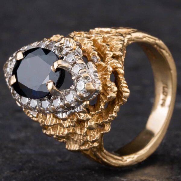 Pre-Owned 9ct Two Colour Gold 2.00ct Oval Sapphire & 0.50ct Brilliant Cut Diamond Marquise Shape Cluster Ring 4336004