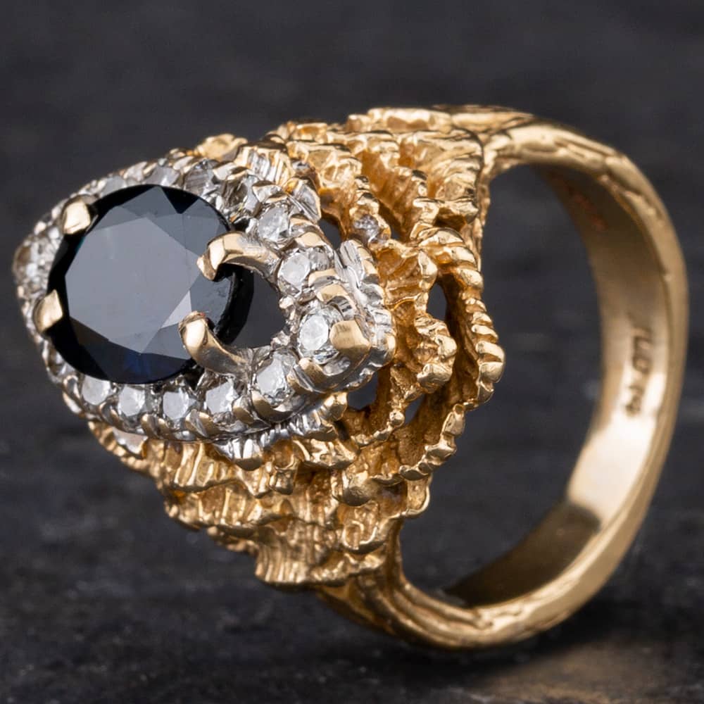 Pre-Owned 9ct Two Colour Gold 2.00ct Oval Sapphire & 0.50ct Brilliant Cut Diamond Marquise Shape Cluster Ring 4336004