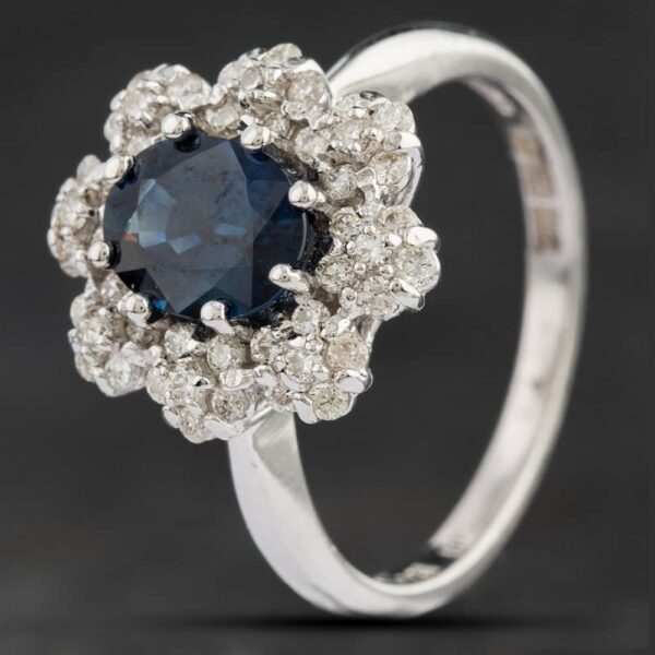 Pre-Owned 18ct White Gold 1.82ct Sapphire & 0.48ct Brilliant Cut Diamond Oval Cluster Ring 4336058