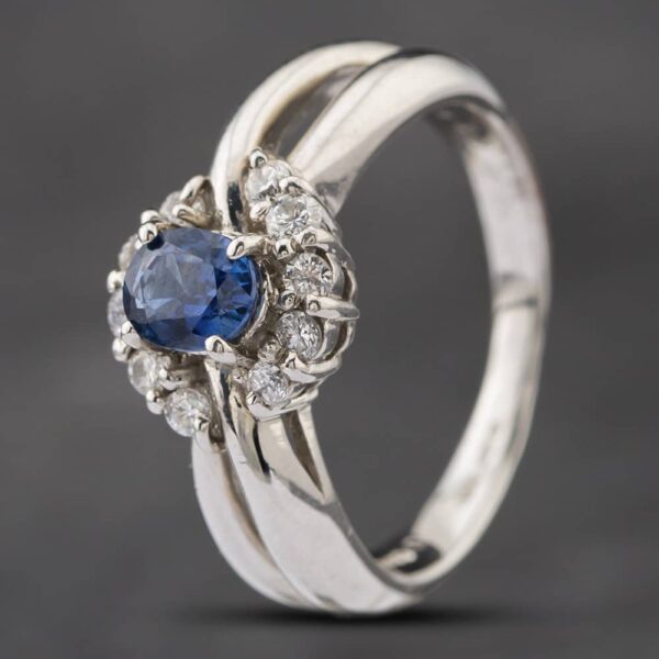 Pre-Owned Platinum 0.58ct Sapphire & 0.20ct Brilliant Cut Diamond Round Cluster Ring 43361095