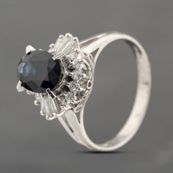 Pre-Owned Platinum 2.20ct Sapphire & 0.41ct Diamond Oval Cluster Ring 43361176