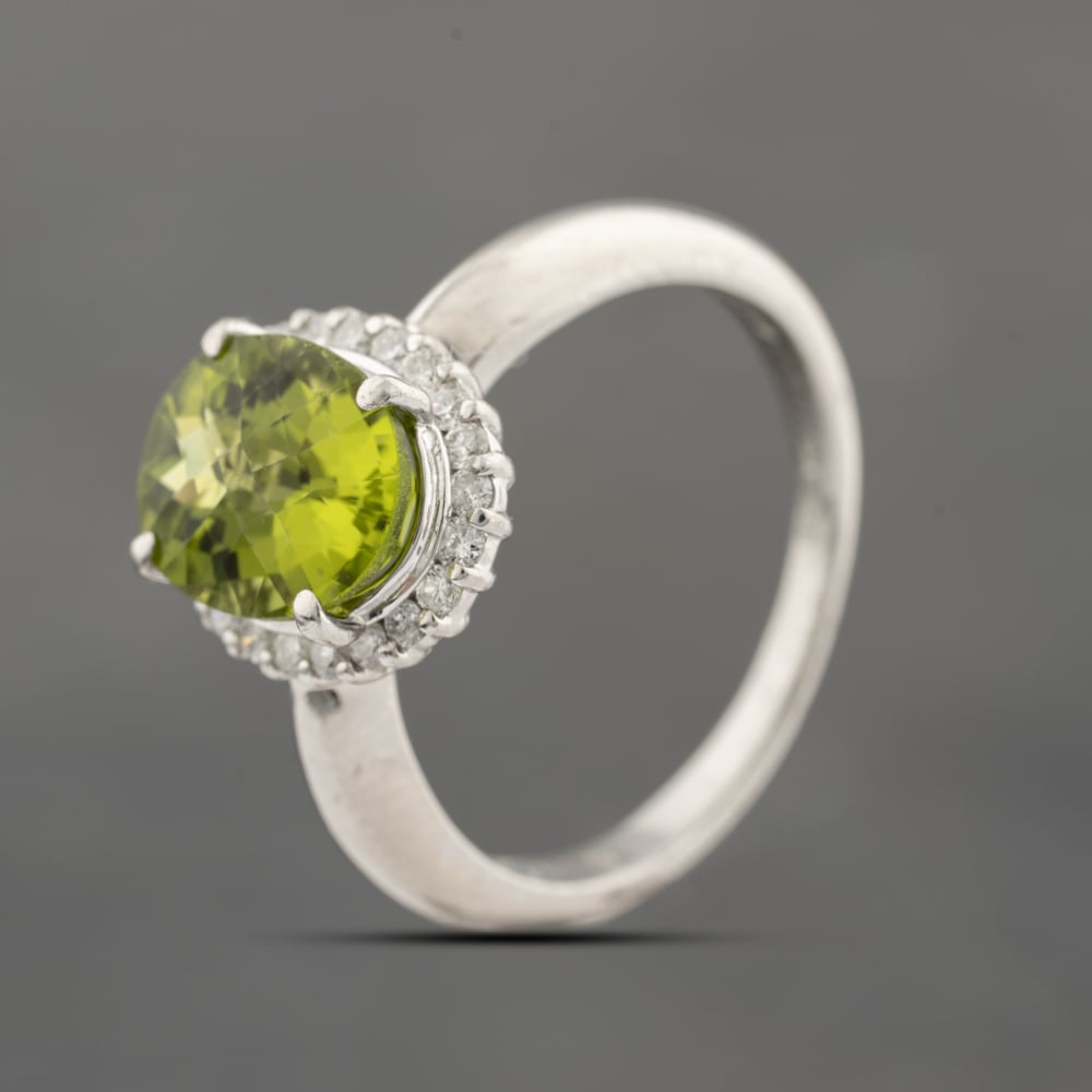 Pre-Owned Platinum 3.01ct Peridot & 0.28ct Diamond Oval Cluster Ring 43541005